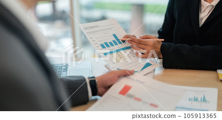 Asian business adviser meeting to analyze and discuss the situation on the financial report in the meeting room. Investment Consultant, Financial Consultant, Financial advisor and accounting concept Asian business adviser meeting to analyze and discuss the situation on the financial report in the meeting room. Investment Consultant, Financial Consultant, Financial advisor and accounting concept 105913365