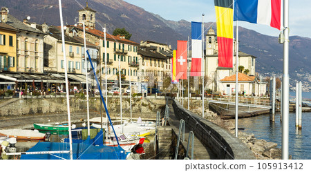 Cannobio. ITALIA. Embankment of Cannobio on the lake Maggiore in the winter afternoon 105913412
