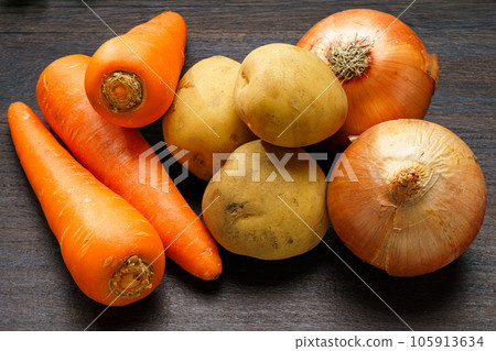 Carrots, onions and potatoes Carrots, onions and potatoes 105913634