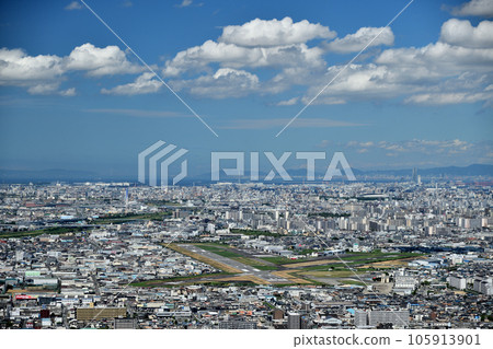 View of Kashiwara and Yao City from the summit of Mt. Takao (View of Yao Airport) [Kashiwara City, Osaka Prefecture] 105913901