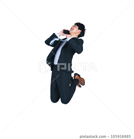 A young businessman jumping while talking on a smartphone background transparent PNG A young businessman jumping while talking on a smartphone background transparent PNG 105916985
