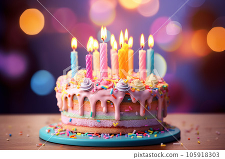 Colorful birthday cake with sprinkles and candles Colorful birthday cake with sprinkles and candles 105918303