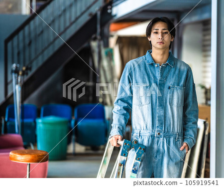 Men in jumpsuits, repair work. 105919541