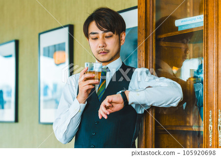 Drinking man 105920698