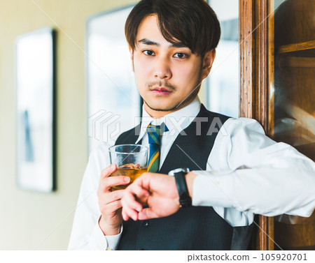 Drinking man 105920701