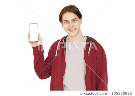 Photo of attractive guy holding smartphone isolated on white color background 105920988