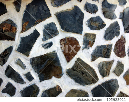 masonry as a background, wall made of stones, white mortar, building texture, black-and-white background 105922021