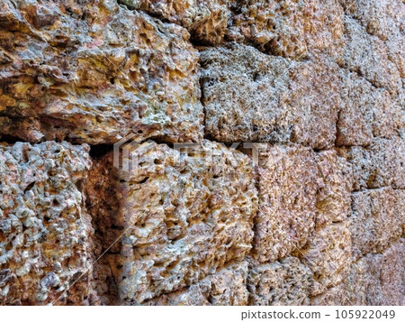 Snapshot presenting a full-frame texture of ancient masonry serving as a background. Snapshot presenting a full-frame texture of ancient masonry serving as a background. 105922049