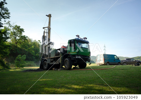 Water well drilling rig preparing to boring dowin into the earth. Water well drilling rig preparing to boring dowin into the earth. 105923049