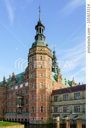 One of the majestic towers of the lakeside facade of Frederiksborg Castle in Hillerod, Denmark One of the majestic towers of the lakeside facade of Frederiksborg Castle in Hillerod, Denmark 105923514