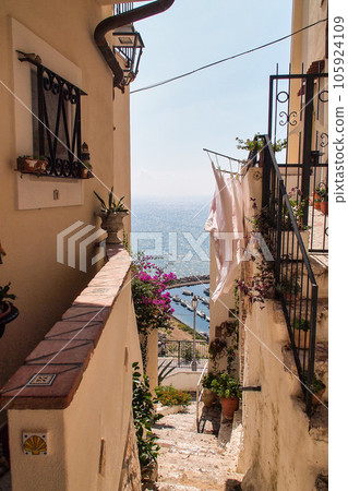 Sea landscape at Sperlonga, Lazio, Italy. Scenic resort town village with nice sand beach Sea landscape at Sperlonga, Lazio, Italy. Scenic resort town village with nice sand beach 105924109