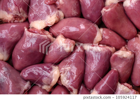 Fresh raw chicken or turkey hearts in a ceramic plate with salt, spices and herbs Fresh raw chicken or turkey hearts in a ceramic plate with salt, spices and herbs 105924117