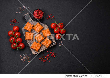 Delicious sandwich consisting of toast, red sauce with salt, spices and herbs 105924190