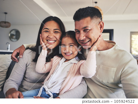 Smile, hug and relax with family on sofa for happy, bonding and support. Love, happiness and lounge with Mexico parents with child and embrace in living room at home for calm, cheerful and peace 105924522