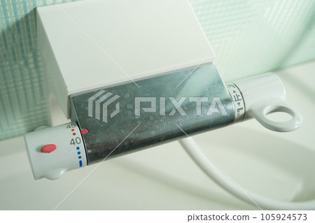 limescale on bath faucet 105924573