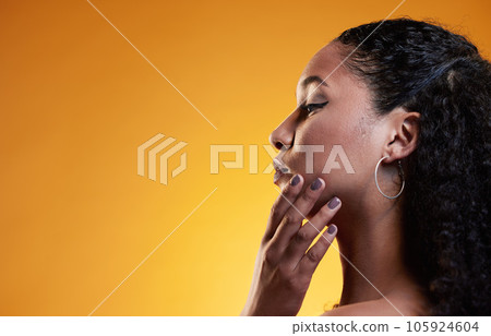 Beauty, hair and space with profile of woman in studio for texture, makeup and cosmetics. Self care, salon and hairstyle with model on orange background for skincare, spa treatment and glow mockup 105924604