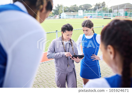 Game planning, soccer team and women with coach tablet for fitness, challenge and match play. Happy, smile and student athlete group with training, sport teamwork and motivation for field workout Game planning, soccer team and women with coach tablet for fitness, challenge and match play. Happy, smile and student athlete group with training, sport teamwork and motivation for field workout 105924671