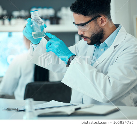 Science, safety and research, man with bottle in laboratory and medical engineering with pharmaceutical solution. Biotechnology, vaccine study and liquid, scientist or lab technician checking glass. 105924785