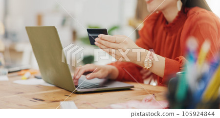 Woman hands, credit card and laptop for business online shopping, trading or fintech payment in office startup. Professional person typing bank information on computer for website loan or transaction 105924844