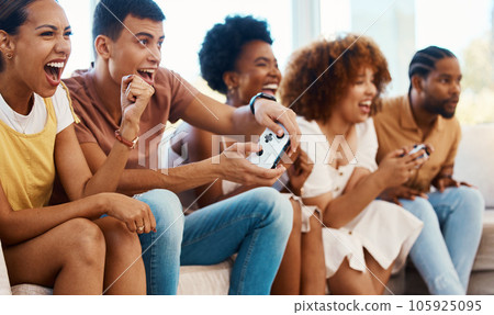 Excited friends together on couch, video game fun and relax in home living room playing with controller. Online gaming, virtual esports app and sofa, happy group of gamer men and women in apartment. 105925095