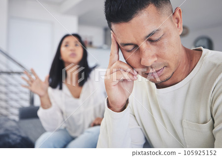 Frustrated couple, headache and fight in argument, divorce or conflict from argument on living room sofa at home. Unhappy man and woman in breakup, cheating affair or toxic relationship at the house 105925152