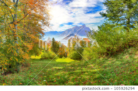 Astonishing autumn view on suburb of Stansstad city and Lucerne lake with mountaines and fog. Astonishing autumn view on suburb of Stansstad city and Lucerne lake with mountaines and fog. 105926294