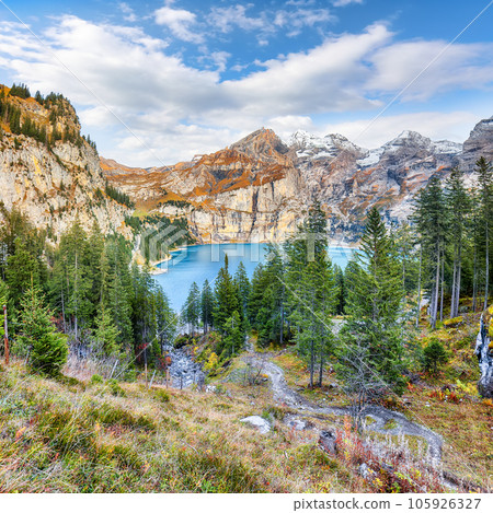 Fabulous autumn view of Oeschinensee Lake. Fabulous autumn view of Oeschinensee Lake. 105926327
