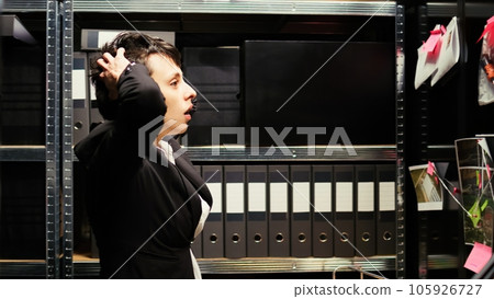 Detective conducting investigation using incriminating proof obtained from classified records and suspect background check. Criminal expert on clandestine operation, police expertise. Detective conducting investigation using incriminating proof obtained from classified records and suspect background check. Criminal expert on clandestine operation, police expertise. 105926727