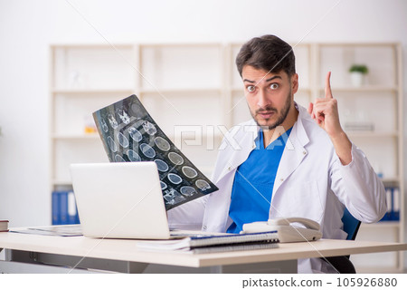 Young male doctor radiologist working in the clinic 105926880