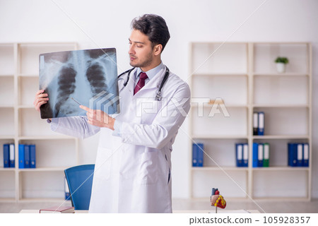 Young male doctor radiologist working in the clinic Young male doctor radiologist working in the clinic 105928357