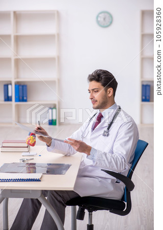 Young male doctor radiologist working in the clinic 105928360
