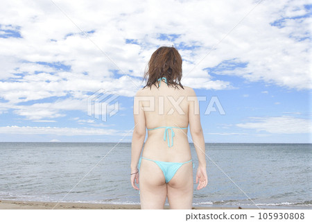 Shoot a portrait of a woman in a bikini on the coast of Esashi, Hokkaido in midsummer Shoot a portrait of a woman in a bikini on the coast of Esashi, Hokkaido in midsummer 105930808