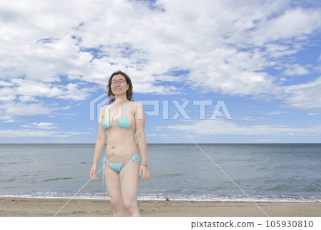 Shoot a portrait of a woman in a bikini on the coast of Esashi, Hokkaido in midsummer Shoot a portrait of a woman in a bikini on the coast of Esashi, Hokkaido in midsummer 105930810