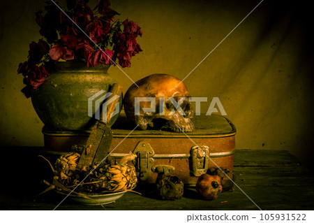 Human skull and flower vase old treasure on wooden table background, Still life concept 105931522