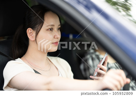 Image of two women driving a car and going on a trip in a refreshing summer | Drive image 105932809