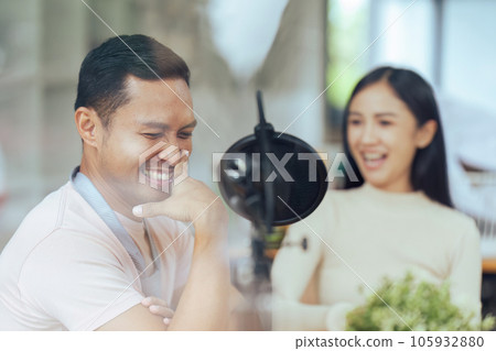 Podcaster is interviewing a guest about the content topic of LGBTQIA. Podcast concept 105932880