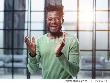 African businessman applauding at business convention and presentation event 105933781