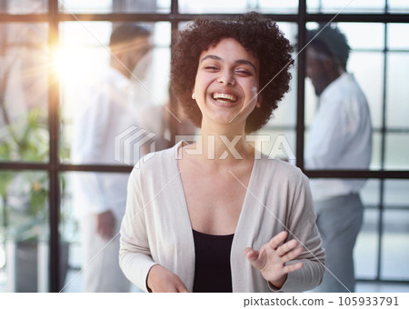 business woman with her staff in background at office business woman with her staff in background at office 105933791