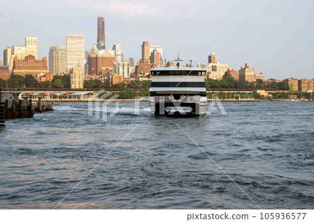 New York City Staten Island Ferry crosses Hudson River New York City Staten Island Ferry crosses Hudson River 105936577