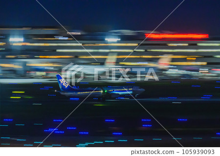 Night view of the airport Aircraft taking off Haneda Airport Terminal 3 105939093