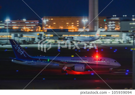 Airport night view Aircraft taxiing Haneda Airport Terminal 3 105939094