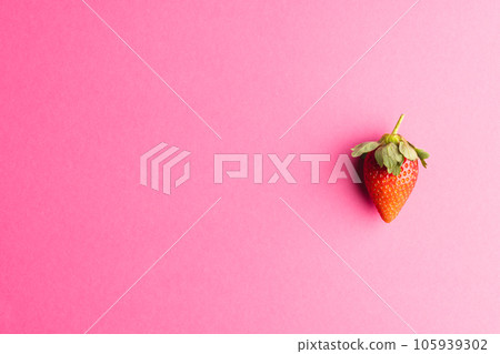 Close up of strawberry and copy space on pink background 105939302