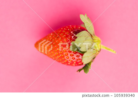 Close up of strawberry and copy space on pink background 105939340