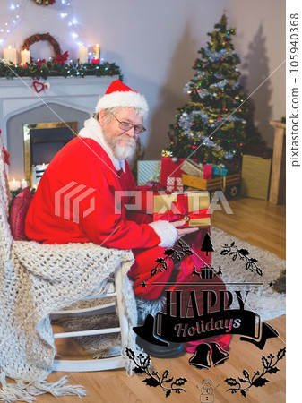 Composition of happy holidays text over santa claus with christmas presents Composition of happy holidays text over santa claus with christmas presents 105940368