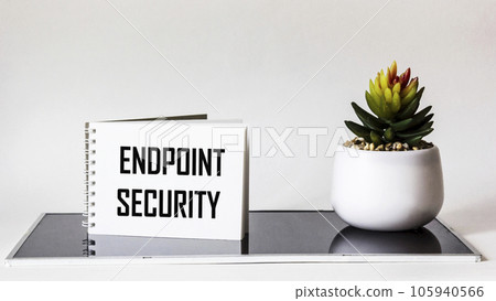 Handwritten Endpoint Security on Notepad. The concept refers to a methodology for protecting  105940566