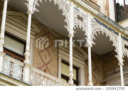 Antique windows and balconies of Villa Hermes in neo-baroque style in Vienna, Austria 105941795