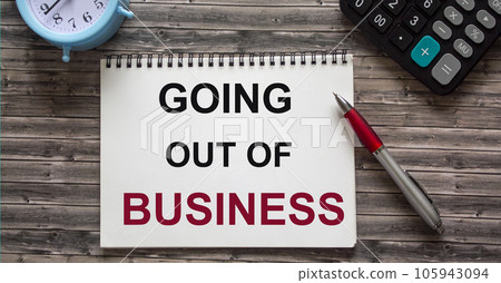 In the notebook, the text GETS OUT OF BUSINESS.  105943094