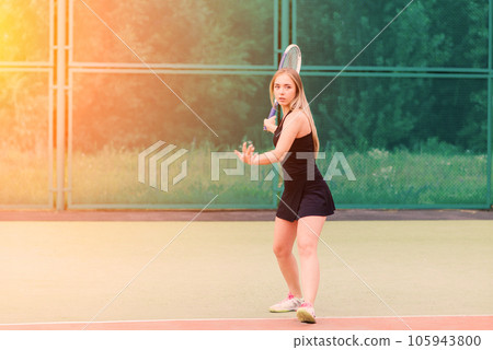 Tennis tournament. Female player at the clay tennis court 105943800