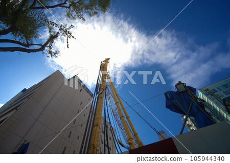 A redevelopment area in Fukuoka City Crane arm at a construction site A redevelopment area in Fukuoka City Crane arm at a construction site 105944340