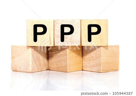 Paycheck Protection Program PPP inscription on wooden cubes on a white background Paycheck Protection Program PPP inscription on wooden cubes on a white background 105944387